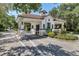 Community entrance with guardhouse and gated access at 1711 Starling Dr # 1711, Sarasota, FL 34231