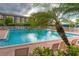 Refreshing community swimming pool with ample lounge chairs at 1711 Starling Dr # 1711, Sarasota, FL 34231