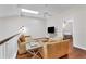 Spacious loft area with leather couches and a TV at 1711 Starling Dr # 1711, Sarasota, FL 34231