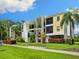 Condo building exterior with landscaping and bike rack at 4212 126Th W St # 409, Cortez, FL 34215