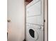 Small laundry closet with stacked washer and dryer at 3333 26Th E Ave # 1026, Bradenton, FL 34208