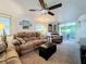 Spacious living room with comfortable seating and large windows at 3333 26Th E Ave # 1026, Bradenton, FL 34208