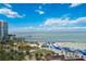 Aerial view of beach, ocean, and high rise building at 301 S Gulfview Blvd # 301, Clearwater Beach, FL 33767