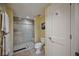 Clean bathroom with shower and toilet at 301 S Gulfview Blvd # 301, Clearwater Beach, FL 33767