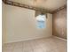 Spacious bedroom with tile floor, window, and neutral walls at 4140 Reflections Pkwy, Sarasota, FL 34233