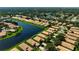Aerial view of property by the lake at 4140 Reflections Pkwy, Sarasota, FL 34233