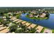 Aerial view of property by the lake at 4140 Reflections Pkwy, Sarasota, FL 34233