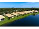 Aerial view of house by the lake at 4140 Reflections Pkwy, Sarasota, FL 34233
