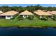 Aerial view of home with lake view at 4140 Reflections Pkwy, Sarasota, FL 34233