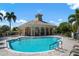 Relax by the community pool with a spa at 4140 Reflections Pkwy, Sarasota, FL 34233