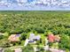 Aerial view of house and surrounding neighborhood at 9044 Misty Creek Dr, Sarasota, FL 34241