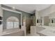 Elegant bathroom with double vanity, large shower, and garden tub at 9044 Misty Creek Dr, Sarasota, FL 34241