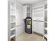 Storage closet with shelving and water heater at 5531 Contento Dr, Sarasota, FL 34242