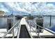 Private dock with boat slips and access to the water at 811 Riviera Dunes Way, Palmetto, FL 34221