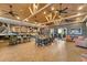 Community room with coffee bar, tables, and comfortable seating at 25081 Spartina Dr, Venice, FL 34293