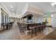 Upscale bar with seating and large screen TV at 25081 Spartina Dr, Venice, FL 34293