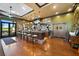 Full bar with seating and access to outdoor patio at 25081 Spartina Dr, Venice, FL 34293