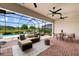 Outdoor patio with seating area and pool access at 25081 Spartina Dr, Venice, FL 34293