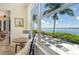 Bright breakfast nook with water views and access to patio at 811 Riviera Dunes Way, Palmetto, FL 34221