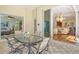 Outdoor patio with seating area and view into the home's interior at 811 Riviera Dunes Way, Palmetto, FL 34221