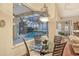 Bright breakfast nook with pool and water views at 811 Riviera Dunes Way, Palmetto, FL 34221
