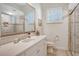 Bathroom with vanity, toilet and walk-in shower at 811 Riviera Dunes Way, Palmetto, FL 34221