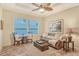 Cozy sitting room with waterfront views and comfortable seating at 811 Riviera Dunes Way, Palmetto, FL 34221