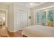 Bedroom with bay window and walk-in closet at 811 Riviera Dunes Way, Palmetto, FL 34221