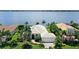 Luxury waterfront home with a two-car garage at 811 Riviera Dunes Way, Palmetto, FL 34221