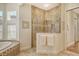 Spa-like bathroom with a large shower, soaking tub, and updated fixtures at 811 Riviera Dunes Way, Palmetto, FL 34221