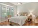 Bedroom with bay window and hardwood floors at 811 Riviera Dunes Way, Palmetto, FL 34221