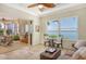 Relaxing sitting room with access to outdoor patio and water views at 811 Riviera Dunes Way, Palmetto, FL 34221
