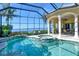 Relaxing screened pool and spa with stunning waterfront views at 811 Riviera Dunes Way, Palmetto, FL 34221