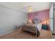 Bedroom with antique bed, ceiling fan and window shutters at 3423 52Nd Avenue W Cir # 267, Bradenton, FL 34210