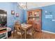 Charming dining area with hardwood floors and wooden hutch at 3423 52Nd Avenue W Cir # 267, Bradenton, FL 34210