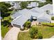 Aerial view of a single-Gathering home with a gray roof and landscaped yard at 3423 52Nd Avenue W Cir # 267, Bradenton, FL 34210
