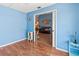 Small home office with wood floors and view of the living room at 3423 52Nd Avenue W Cir # 267, Bradenton, FL 34210