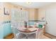 Cozy breakfast nook with round table and four chairs at 3423 52Nd Avenue W Cir # 267, Bradenton, FL 34210