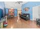 Light and airy dining area with wood floors and built-in hutch at 3423 52Nd Avenue W Cir # 267, Bradenton, FL 34210