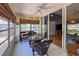 Relaxing sunroom with wicker furniture and access to the backyard at 3423 52Nd Avenue W Cir # 267, Bradenton, FL 34210