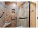 Large walk-in shower with tile surround and built-in seat at 3423 52Nd Avenue W Cir # 267, Bradenton, FL 34210