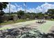 Community shuffleboard court with tables and benches at 3423 52Nd Avenue W Cir # 267, Bradenton, FL 34210