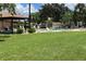 Relaxing community pool with lounge chairs and covered seating at 3423 52Nd Avenue W Cir # 267, Bradenton, FL 34210