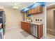 Well-equipped kitchen featuring stainless steel appliances and wood cabinets at 3423 52Nd Avenue W Cir # 267, Bradenton, FL 34210