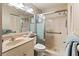 Bathroom with shower, toilet and granite countertop at 3423 52Nd Avenue W Cir # 267, Bradenton, FL 34210