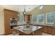 Gourmet kitchen features granite countertops, stainless steel appliances, and an island at 360 N Point Rd, Osprey, FL 34229