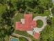Bird's eye view of single story home with red tile roof and circular driveway at 360 N Point Rd, Osprey, FL 34229