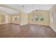 Spacious dining room featuring hardwood floors and abundant natural light at 360 N Point Rd, Osprey, FL 34229