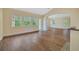Bright dining area with hardwood floors and access to other rooms at 360 N Point Rd, Osprey, FL 34229