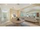 Open entryway view of living room with hardwood floors and arched opening at 360 N Point Rd, Osprey, FL 34229